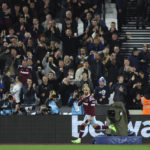 
              West Ham's Said Benrahma celebrates after scoring his sides second goal during the English Premier League soccer match between West Ham United and Bournemouth at the London Stadium in London, England, Monday, Oct. 24, 2022. (AP Photo/Ian Walton)
            