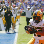 
              Missouri running back Cody Schrader crosses the goal line on a 5-yard touchdown run against Florida during the first half of an NCAA college football game, Saturday, Oct. 8, 2022, in Gainesville, Fla. (AP Photo/John Raoux)
            