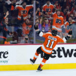 
              Philadelphia Flyers' Travis Konecny celebrates after scoring a goal during the second period of an NHL hockey game against the New Jersey Devils, Thursday, Oct. 13, 2022, in Philadelphia. (AP Photo/Matt Slocum)
            