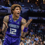 
              Charlotte Hornets guard Kelly Oubre Jr. (12) reacts to a no call during the first half of an NBA basketball game on Saturday, Oct. 29, 2022, in Charlotte, N.C. (AP Photo/Scott Kinser)
            