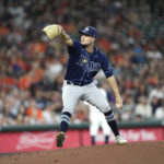 
              Tampa Bay Rays starting pitcher Shane McClanahan throws against the Houston Astros during the first inning of a baseball game Saturday, Oct. 1, 2022, in Houston. (AP Photo/David J. Phillip)
            