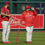 
              Philadelphia Phillies interim manager Rob Thomson, right, talks with Darick Hall during baseball practice Thursday, Oct. 6, 2022, in St. Louis. The Phillies and St. Louis Cardinals are set to play Game 1 of a National League Wild Card baseball playoff series on Friday in St. Louis. (AP Photo/Jeff Roberson)
            