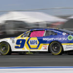 
              Chase Elliott (9) races during a NASCAR Cup Series auto race at Charlotte Motor Speedway, Sunday, Oct. 9, 2022, in Concord, N.C. (AP Photo/Matt Kelley)
            