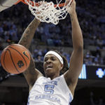 
              FILE - North Carolina forward Armando Bacot (5) dunks against Duke during the first half of an NCAA college basketball game, Saturday, Feb. 5, 2022, in Chapel Hill, N.C. Bacot was named to The Associated Press preseason All-America team, Monday, Oct. 24, 2022.(AP Photo/Chris Seward, File)
            