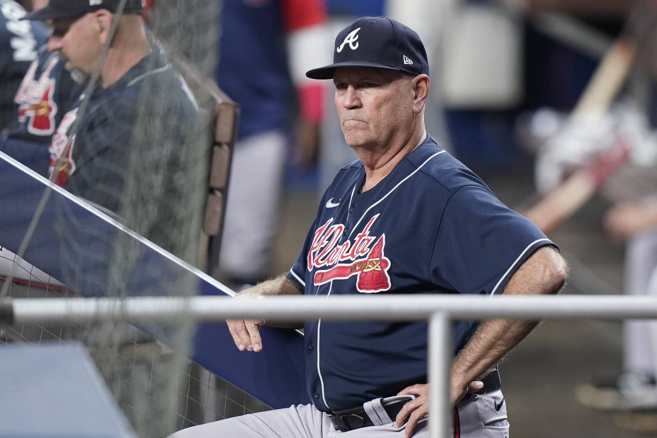 Atlanta Braves manager Brian Snitker looks on during the fourth inning of a baseball game against t...