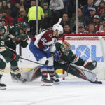 
              Colorado Avalanche right wing Mikko Rantanen (96) scores a goal against Minnesota Wild goaltender Filip Gustavsson, right, during the second period of an NHL hockey game Monday, Oct. 17, 2022, in St. Paul, Minn. (AP Photo/Stacy Bengs)
            