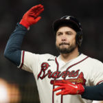 
              Atlanta Braves' Travis d'Arnaud (16) reacts after an RBI-single during the sixth inning in Game 2 of baseball's National League Division Series between the Atlanta Braves and the Philadelphia Phillies, Wednesday, Oct. 12, 2022, in Atlanta. (AP Photo/Brynn Anderson)
            