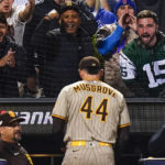 
              Baseball fans react as San Diego Padres starting pitcher Joe Musgrove (44) walks off the field at the end of the seventh inning of Game 3 of a National League wild-card baseball playoff series against the New York Mets, Sunday, Oct. 9, 2022, in New York. (AP Photo/Frank Franklin II)
            