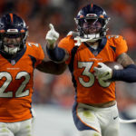
              Denver Broncos safety Caden Sterns, right, celebrates an interception against the Indianapolis Colts during the second half of an NFL football game, Thursday, Oct. 6, 2022, in Denver. (AP Photo/Jack Dempsey)
            