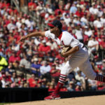 
              St. Louis Cardinals starting pitcher Adam Wainwright throws during the second inning of a baseball game against the Pittsburgh Pirates Sunday, Oct. 2, 2022, in St. Louis. (AP Photo/Jeff Roberson)
            