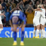 
              England's Lauren Hemp, second right, celebrates with teammates after scoring her side's opening goal during the women's friendly soccer match between England and the US at Wembley stadium in London, Friday, Oct. 7, 2022. (AP Photo/Kirsty Wigglesworth)
            