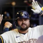 
              Milwaukee Brewers' Rowdy Tellez is congratulated after hitting a home run during the eighth inning of a baseball game against the Arizona Diamondbacks Wednesday, Oct. 5, 2022, in Milwaukee. (AP Photo/Morry Gash)
            