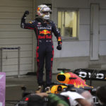 
              Red Bull driver Max Verstappen of the Netherlands celebrates after winning the Japanese Formula One Grand Prix at the Suzuka Circuit in Suzuka, central Japan, Sunday, Oct. 9, 2022. Verstappen secured second consecutive Formula One drivers' championship. (AP Photo/Toru Hanai)
            