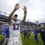 
              Buffalo Bills quarterback Josh Allen (17) waves to fans as he leaves the field after a 23-20 win over the Baltimore Ravens in an NFL football game Sunday, Oct. 2, 2022, in Baltimore. (AP Photo/Julio Cortez)
            
