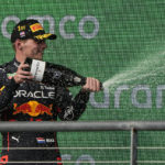 
              Red Bull driver Max Verstappen, of the Netherlands, sprays champagne after winning the Formula One U.S. Grand Prix auto race at Circuit of the Americas, Sunday, Oct. 23, 2022, in Austin, Texas. (AP Photo/Eric Gay)
            