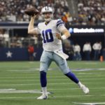 
              Dallas Cowboys quarterback Cooper Rush (10) throws a pass in the first half of a NFL football game against the Washington Commanders in Arlington, Texas, Sunday, Oct. 2, 2022. (AP Photo/Ron Jenkins)
            