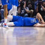
              Dallas Mavericks guard Luka Doncic (77) reacts after being fouled during the second half of an NBA basketball game against the Oklahoma City Thunder, Saturday, Oct. 29, 2022, in Dallas.  (AP Photo/Brandon Wade)
            