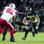 
              Purdue running back Devin Mockobee (45) cuts away from Nebraska defensive lineman Colton Feist (82) during the first half of an NCAA college football game in West Lafayette, Ind., Saturday, Oct. 15, 2022. (AP Photo/Michael Conroy)
            