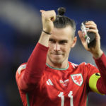 
              FILE - Wales' Gareth Bale reacts after the UEFA Nations League soccer match between Wales and Poland at the Cardiff City Stadium in Cardiff, Wales, Sunday, Sept. 25, 2022. (AP Photo/Frank Augstein, File)
            