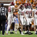 
              Alabama place kicker Will Reichard (16) walks off the field after missing a field goal during the second half of an NCAA college football game against Tennessee Saturday, Oct. 15, 2022, in Knoxville, Tenn. Tennessee won 52-49. (AP Photo/Wade Payne)
            