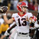 
              Georgia quarterback Stetson Bennett throws during the first half of an NCAA college football game against Missouri Saturday, Oct. 1, 2022, in Columbia, Mo. (AP Photo/L.G. Patterson)
            