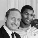 
              FILE - Georgia running back Herschel Walker, right, brings a smile to the face of his coach Vince Dooley as he announces that he would play football next year at Georgia rather than the USFL, Feb. 8, 1983 in  Athens, Ga. Vince Dooley, the football coach who carried himself like a professor and guided Georgia for a quarter-century of success that included the 1980 national championship, died Friday, Oct. 28, 2022. He was 90. (AP Photo/Joe Holloway Jr., File)
            