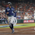 
              Seattle Mariners center fielder Julio Rodriguez (44) celebrates after scoring against the Houston Astros during the second inning in Game 1 of an American League Division Series baseball game in Houston,Tuesday, Oct. 11, 2022. (AP Photo/David J. Phillip)
            
