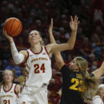 
              FILE - Iowa State guard Ashley Joens drives past Iowa forward Logan Cook during an NCAA college basketball game Wednesday, Dec. 8, 2021, in Ames, Iowa. Joens was named to the women's Associated Press preseason All-America team, Tuesday, Oct. 25, 2022. (Bryon Houlgrave/The Des Moines Register via AP, File)
            