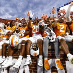 
              FILE - Tennessee running back Jaylen Wright (20) and teammates celebrates a 38-33 win after an NCAA college football game against Florida, Saturday, Sept. 24, 2022, in Knoxville, Tenn. (AP Photo/Wade Payne, File)
            