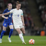 
              England's Keira Walsh, right, controls the ball ahead United States' Rose Lavelle during the women's friendly soccer match between England and the US at Wembley stadium in London, Friday, Oct. 7, 2022. (AP Photo/Kirsty Wigglesworth)
            