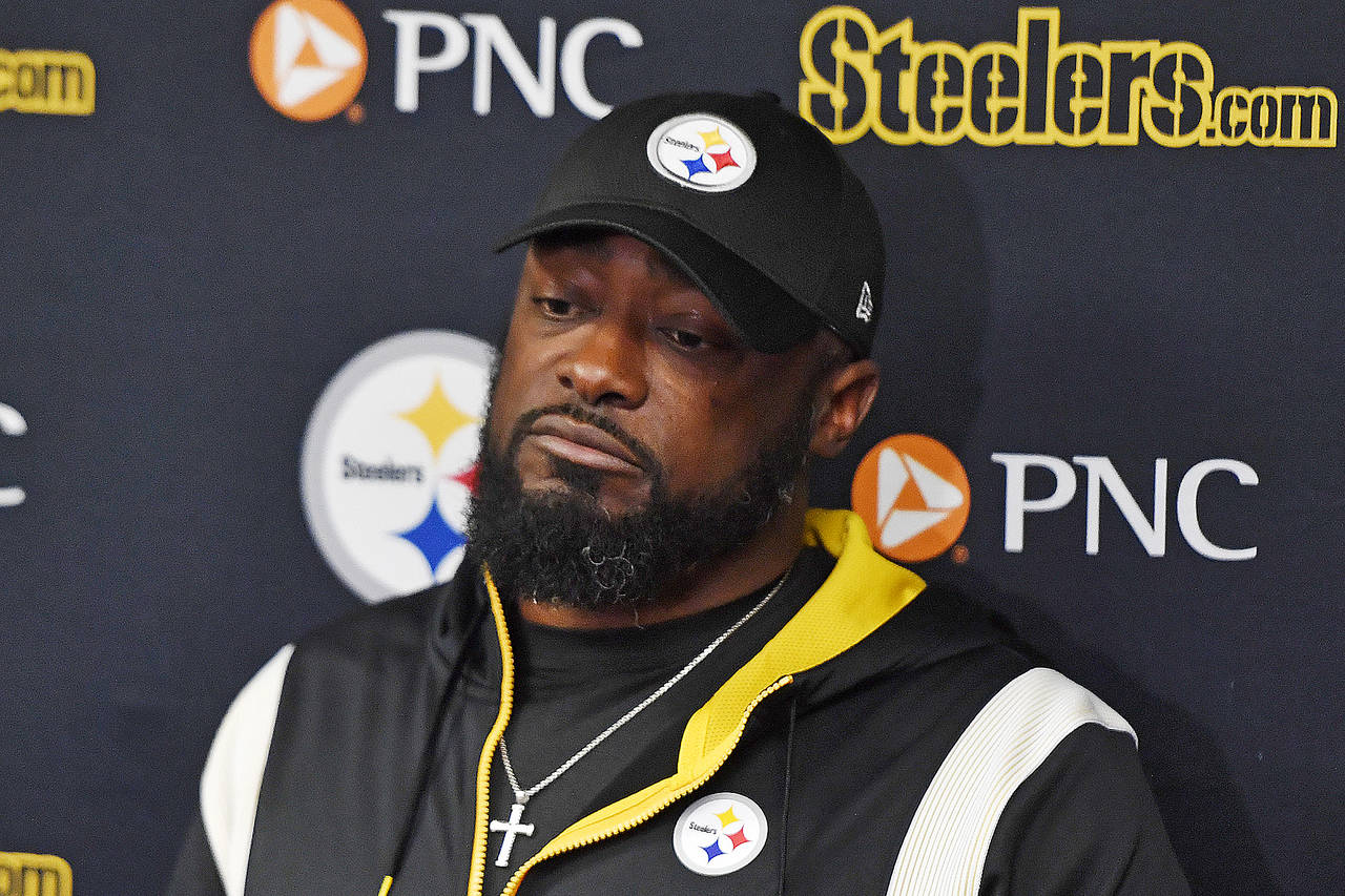 Pittsburgh Steelers head coach Mike Tomlin meets with reporters after an NFL football game against ...