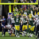 
              Green Bay Packers place kicker Mason Crosby (2) celebrates after kicking a 31-yard field goal during overtime in an NFL football game against the New England Patriots, Sunday, Oct. 2, 2022, in Green Bay, Wis. The Packers won 27-24. (AP Photo/Mike Roemer)
            