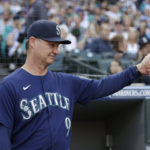 
              Seattle Mariners manager Scott Servais gives a thumbs up to a fan before a baseball game against the Oakland Athletics, Saturday, Oct. 1, 2022, in Seattle. (AP Photo/John Froschauer)
            