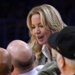 
              Los Angeles Lakers owner Jeanie Buss, second from right, talks with Los Angeles Clippers owner Steve Ballmer, second from left, during the second half of an NBA basketball game Thursday, Oct. 20, 2022, in Los Angeles. (AP Photo/Mark J. Terrill)
            