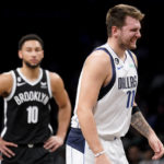 
              Dallas Mavericks guard Luka Doncic (77) reacts after missing a free throw during the first half of an NBA basketball game against the Brooklyn Nets, Thursday, Oct. 27, 2022, in New York. (AP Photo/John Minchillo)
            