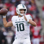 
              Michigan State quarterback Payton Thorne looks to pass against Maryland during the second half of an NCAA college football game, Saturday, Oct. 1, 2022, in College Park, Md. (AP Photo/Julio Cortez)
            