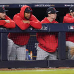 
              Cleveland Guardians players watch play from the dugout during the eighth inning of Game 5 of an American League Division baseball series against the New York Yankees, Tuesday, Oct. 18, 2022, in New York. (AP Photo/Frank Franklin II)
            