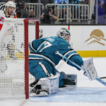 
              San Jose Sharks goaltender James Reimer (47) deflects a shot against the Vegas Golden Knights during the second period of an NHL hockey game in San Jose, Calif., Tuesday, Oct. 25, 2022. (AP Photo/Godofredo A. Vásquez)
            