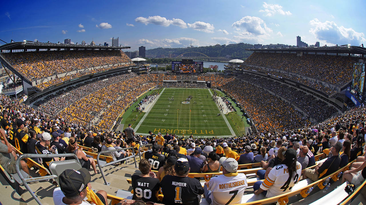 The Pittsburgh Steelers face the New England Patriots during an NFL football game at Acrisure Stadi...