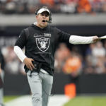 
              Las Vegas Raiders head coach Josh McDaniels reacts to a call during the first half of an NFL football game against the Denver Broncos, Sunday, Oct. 2, 2022, in Las Vegas. (AP Photo/Abbie Parr)
            