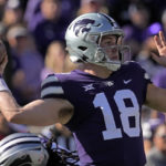 
              Kansas State quarterback Will Howard throws during the first half of an NCAA college football game against Oklahoma State Saturday, Oct. 29, 2022, in Manhattan, Kan. (AP Photo/Charlie Riedel)
            
