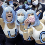 
              FILE - North Carolina fans don wigs in the team colors and cheer for the team before the start of of an NCAA college basketball game against Duke, Saturday, Feb. 5, 2022, in Chapel Hill, N.C. With four starters back from the team that blew a 15-point halftime lead to Kansas at the Superdome in New Orleans, the Tar Heels were the runaway pick as the preseason No. 1 in the AP Top 25 on Monday, Oct. 17, 2022.(AP Photo/Chris Seward, File)
            