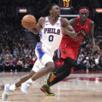 
              Philadelphia 76ers' Tyrese Maxey, left, drives past Toronto Raptors' Pascal Siakam during the second half of an NBA basketball game, Friday, Oct. 28, 2022 in Toronto. (Chris Young/The Canadian Press via AP)
            