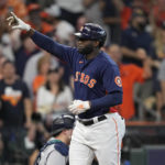 
              Houston Astros designated hitter Yordan Alvarez celebrates his two-run home run against the Seattle Mariners during the sixth inning in Game 2 of an American League Division Series baseball game in Houston, Thursday, Oct. 13, 2022. (AP Photo/David J. Phillip)
            