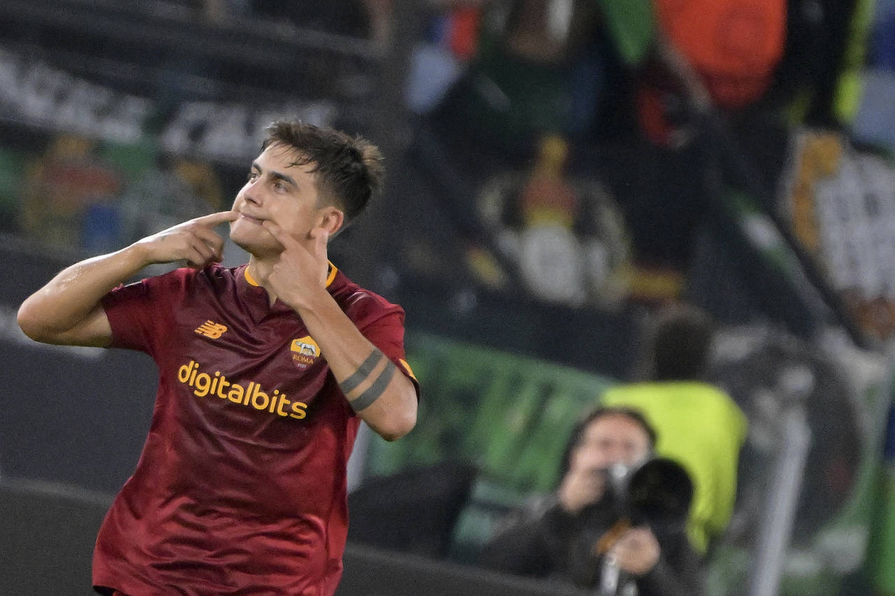 AS Roma's Paulo Dybala celebrates after scoring to 1-0 during the Europa League soccer match betwee...