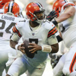 
              Cleveland Browns quarterback Jacoby Brissett (7) moves oput of the pocket against the Atlanta Falcons during the first half of an NFL football game, Sunday, Oct. 2, 2022, in Atlanta. (AP Photo/John Bazemore)
            