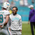 
              Miami Dolphins head coach Mike McDaniel, right, talks with Miami Dolphins quarterback Skylar Thompson (19) during warm-ups ahead of an NFL football game against the Minnesota Vikings, Sunday, Oct. 16, 2022, in Miami Gardens, Fla. (AP Photo/Wilfredo Lee)
            
