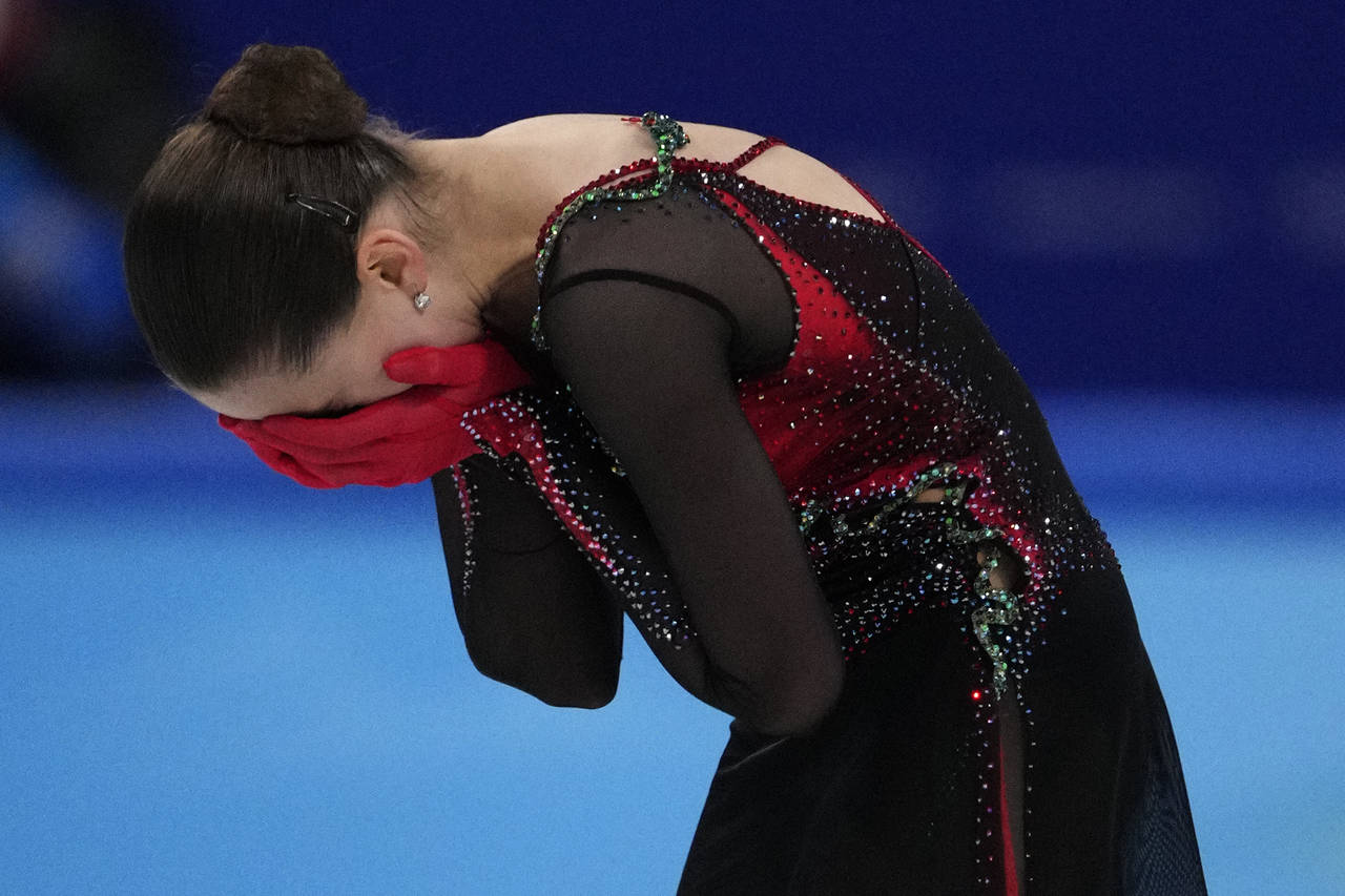 FILE - Kamila Valieva, of the Russian Olympic Committee, reacts after the women's free skate progra...