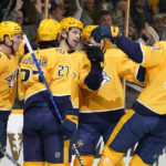 
              Nashville Predators' Zach Sanford, third from left, celebrates after scoring a goal against the St. Louis Blues in the second period of an NHL hockey game Thursday, Oct. 27, 2022, in Nashville, Tenn. (AP Photo/Mark Humphrey)9
            