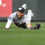 
              Detroit Tigers right fielder Victor Reyes narrowly misses a diving catch on a ball hit by Seattle Mariners' Curt Casali, who singled during the eighth inning of the first game of a baseball doubleheader, Tuesday, Oct. 4, 2022, in Seattle. (AP Photo/Caean Couto)
            